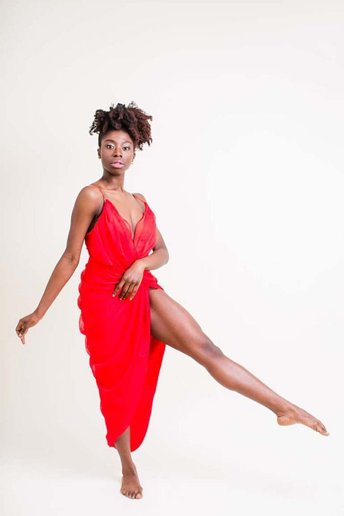 nigerian-african-girl-dancing-in-red-plunge-line-dress-sexy-sophisticated-glamour-look